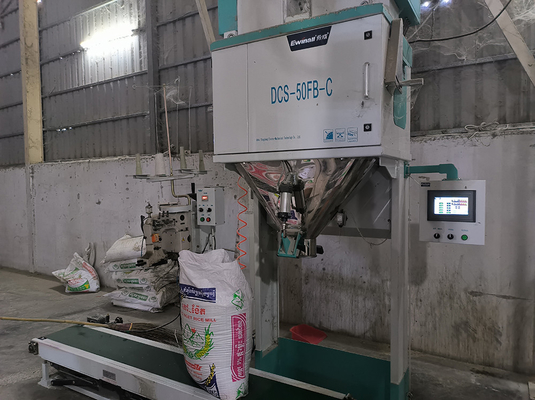 De Verpakkingsmachine 5kg 10kg 15kg 25kg van de Ewinall DCS-50fb-c Automatische Handrijst